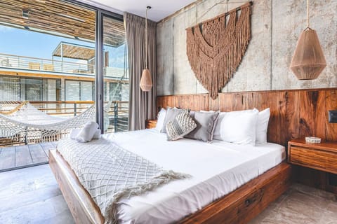 Relax in a beautifully designed sanctuary featuring cozy interiors, natural light, and tropical charm