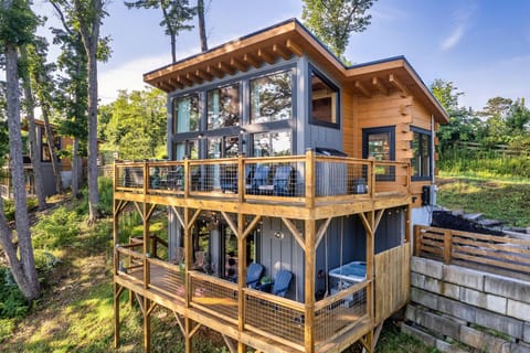 Welcome to our beautiful, luxury & modern cabin. With two patio balconies, hot tub, swings and in a perfect location for your Smoky Mountain getaway.
