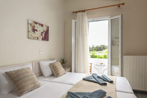 Standard Triple Room | In-room safe, iron/ironing board, free cribs/infant beds, free WiFi