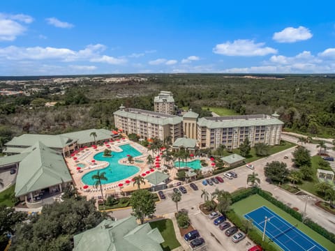 Experience resort-style living with a stunning pool view and expansive greens.