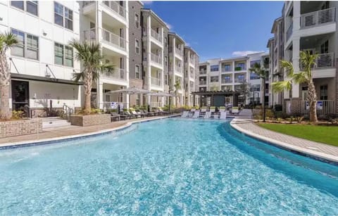 Property pool, grill, patio area which is located across from loft. 