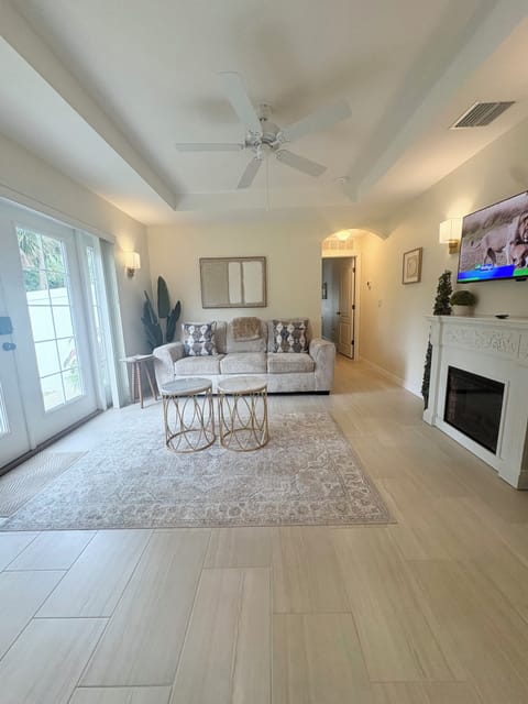 Cozy living room with fireplace and smart tv