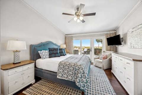 The primary bedroom has direct access to the oceanfront patio