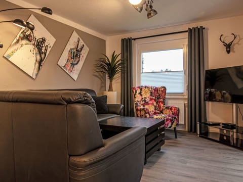 Furniture, Flooring, Floor, Interior Design, Couch, Room, Wood Flooring, Living Room, Comfort