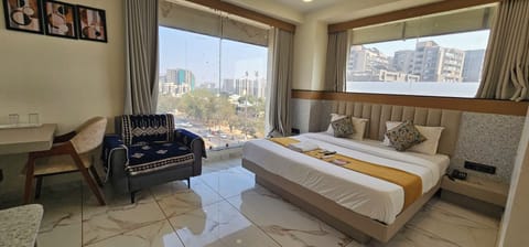 Deluxe Double Room, City View | Laptop workspace, iron/ironing board, free WiFi