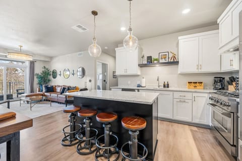 Open-concept kitchen with large island seating.