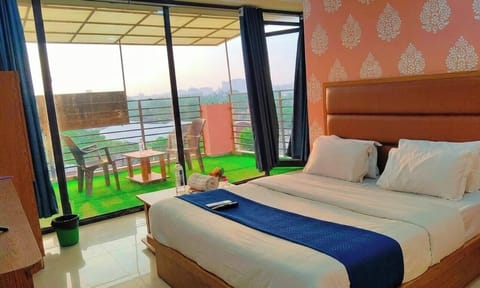 Deluxe Room, City View | Balcony view