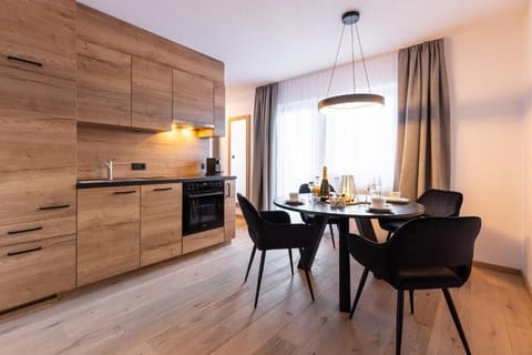 Apartment, Balcony, Mountain View | Private kitchen | Highchair