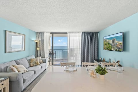 Let in the sunrays as you relax in the comfort of this living room with a view.