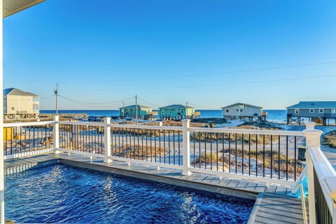 The view from the front deck, beyond the brand new pool! Beach access nearby.