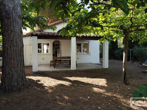 Entrance to the house with covered terrace