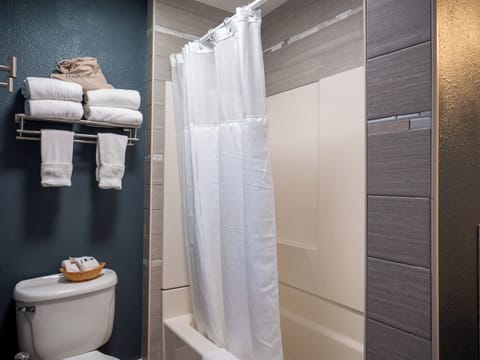 Double Room, 2 Queen Beds, Non Smoking | Bathroom | Combined shower/tub, free toiletries, hair dryer, towels