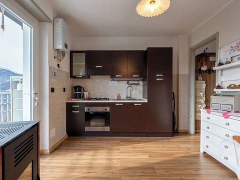 Furniture, Interior Design, Flooring, Wood, Kitchen, Cabinetry, Major Appliance, Kitchen Appliance, Floor, Room