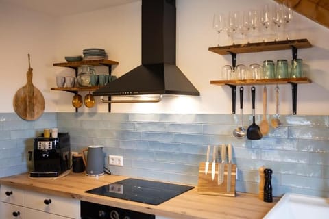 Deluxe Apartment, Balcony, Garden View | Private kitchen | Highchair