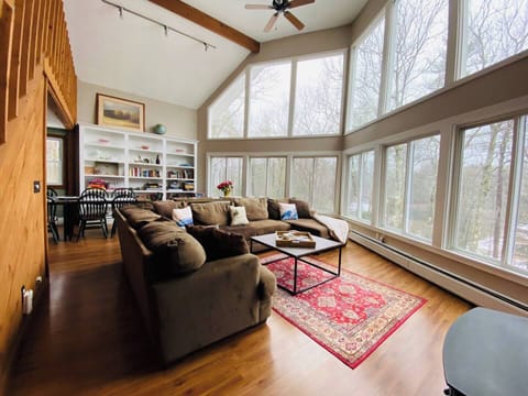 Second floor great room with 2 story windows overlooking Moat Mountain