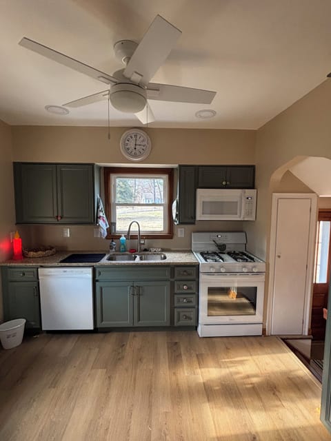 Full furnished kitchen with gas stove, refrigerator, and dishwasher!
