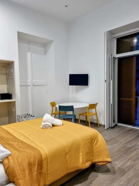 Deluxe Quadruple Room | In-room safe, desk, laptop workspace, soundproofing