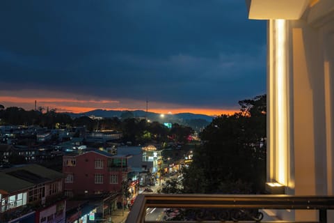 Deluxe Quadruple Room, 2 Queen Beds, Air conditioning, City View | Balcony view