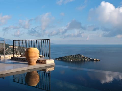 Elevated seaside living above the blue horizon.