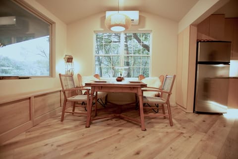 Open floor plan and dining room with a view
