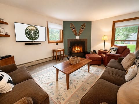 Welcome to Rabbit Hole—curl up by the wood-burning fire after a full day on the mountain