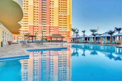 Splash, play, and make memories—our heated zero-entry pool is perfect for kids and adults alike. Tikki bar for your favorite cocktails, hot tub, fire pit, 2 sets of corn hole boards and checkers.