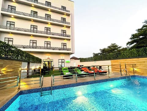 Deluxe Room, Balcony, City View | Pool