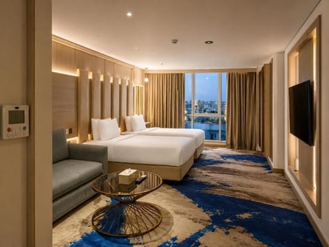 Deluxe Queen Suite | Premium bedding, down comforters, minibar, in-room safe