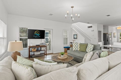 Living room has access to the 2nd floor balcony for those magnificent views and cool summer breezes.