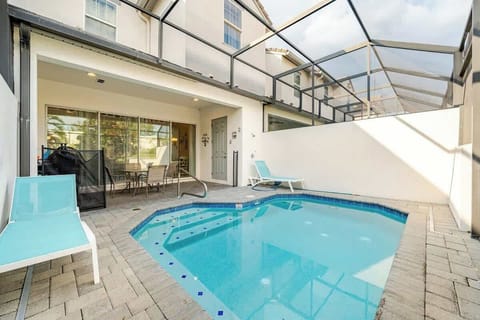 Pool (with child gate) enclosed in Lanai 