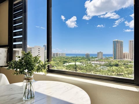 Enjoying a quiet moment with a spectacular panoramic view of Honolulu.