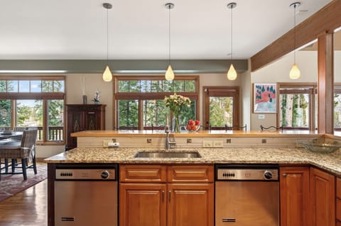 Straight-on view of the kitchen sink and prep area.