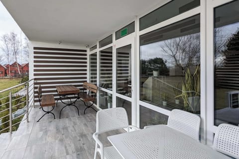 The terrace provides a perfect spot for enjoying the fresh air.