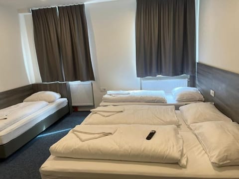 Classic Quadruple Room, City View