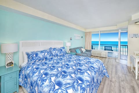 Comfortable studio living space with ocean vibes