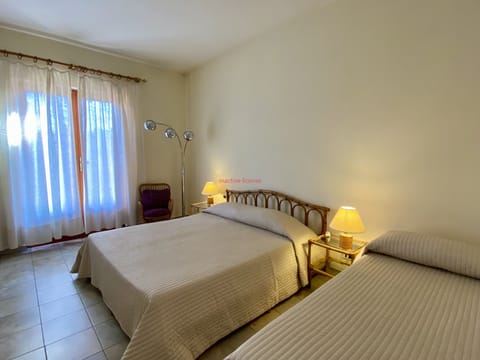 Quadruple Room | Down comforters, blackout drapes, free WiFi