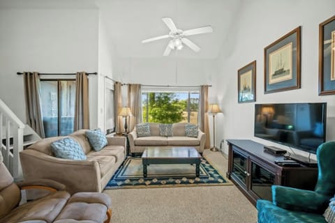 This comfy living room offers space for everyone to gather!