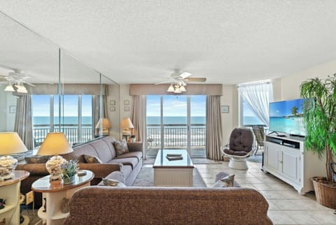 The ocean front living room is well-appointed with comfortable furnishings.