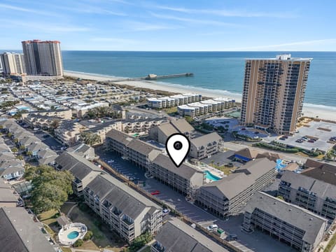 Oceanview condo overlooking multiple pools, walk to the Apache Pier, Resturaunts and so much more! 