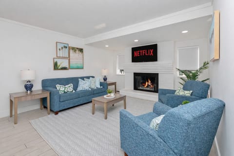 Bright, cozy living area with a sleeper sofa that easily pulls out into a bed. Relax by the fireplace or stream your favorites on the flat-screen smart TV with Netflix—perfect for unwinding after a day out.