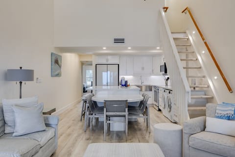 Gorgeous living room and kitchen with expansive island, new Samsung Bespoke appliances