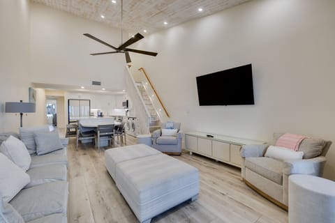 Gorgeous living room and kitchen with expansive island, new Samsung Bespoke appliances