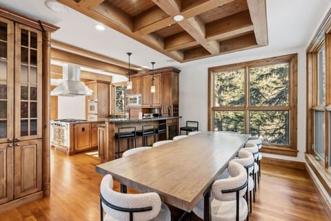 Spacious dining room with seating for 10, plus bar seating