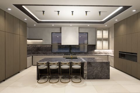 Enjoy the auxiliary prep kitchen with marble counters and premium appliances