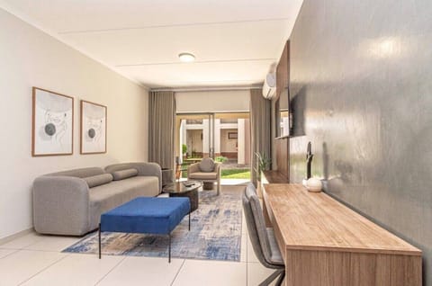Luxury Apartment, Air conditioning | Living area | Flat-screen TV