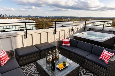 Take in Nashville views from the rooftop hot tub and seating area