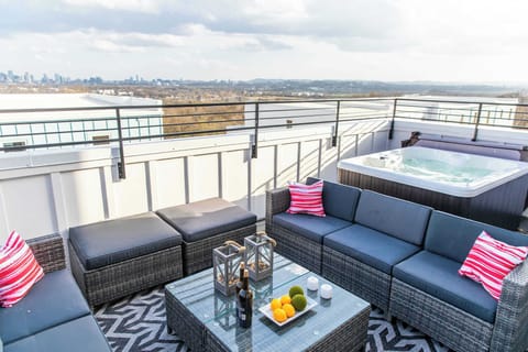 Relax on the rooftop with a hot tub and seating while taking in Nashville’s skyline.