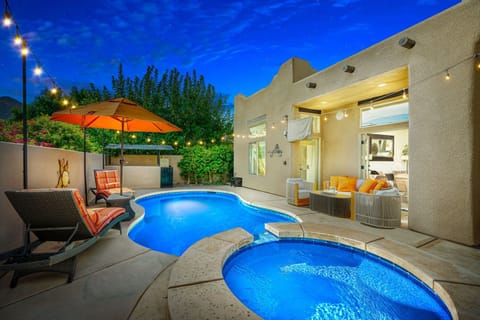 Private pool and spa illuminated for magical nights.