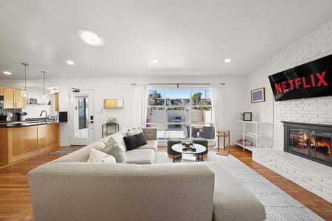 Open living room with TV and seating