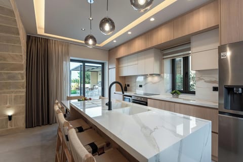 Villa | Private kitchen | Full-size fridge, microwave, oven, stovetop